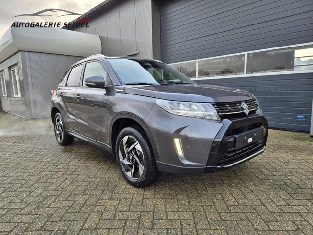 Suzuki Vitara Comfort+ 110PS Automatik MHEV 4x4 ALLGRIP 1.4 Boosterjet Allrad Teilleder Navi Klimaautomatik Sitzheizung ACC PDC v+h Rückf.Kamera Suzuki-Radio Apple CarPlay Android Auto Touchscreen 2xKeyless 17-LM 