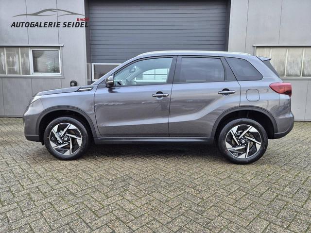Suzuki Vitara Comfort+ 110PS Automatik MHEV 4x4 ALLGRIP 1.4 Boosterjet Allrad Teilleder Navi Klimaautomatik Sitzheizung ACC PDC v+h Rückf.Kamera Suzuki-Radio Apple CarPlay Android Auto Touchscreen 2xKeyless 17-LM 