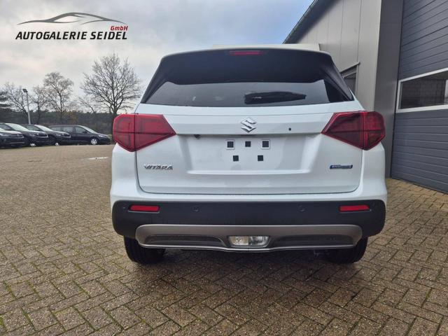 Suzuki Vitara Comfort+ 110PS Automatik MHEV 4x4 ALLGRIP 1.4 Boosterjet Allrad Teilleder Navi Klimaautomatik Sitzheizung ACC PDC v+h Rückf.Kamera Suzuki-Radio Apple CarPlay Android Auto Touchscreen 2xKeyless 17-LM 
