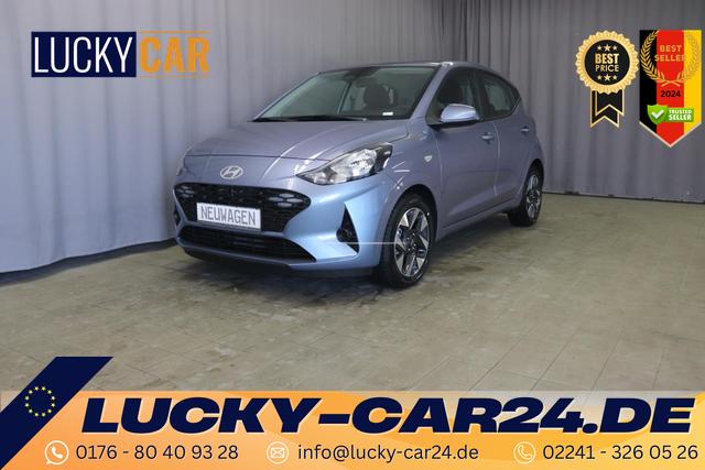 Lagerfahrzeug Hyundai i10 - Comfort 1.2 5MT 62kW (84 PS) Radio mit DAB, Apple CarPlay & Android Auto, Rückfahrkamera, 15" Leichtmetallfelgen, Tempolimitassistent, Spursicherheit, Sicherheit vorne, Fernlichtassistent, uvm.