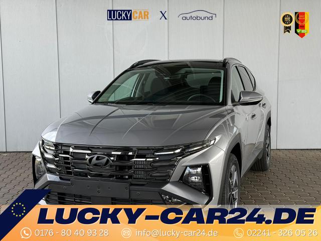 Gebrauchtfahrzeug Hyundai TUCSON - E-Motion 1.6 T-GDI 2WD 48V DCT / Panoramadach ACC Sitz   Lenkradheizung LED Navi PDC V&H Kamera Alu 18"