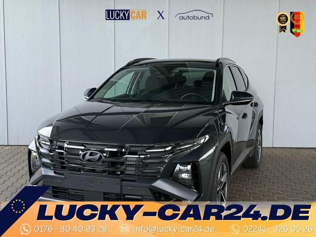 Gebrauchtfahrzeug Hyundai TUCSON - E-Motion 1.6 T-GDI 2WD 48V DCT / Panoramadach ACC Sitz   Lenkradheizung LED Navi PDC V&H Kamera Alu 18"