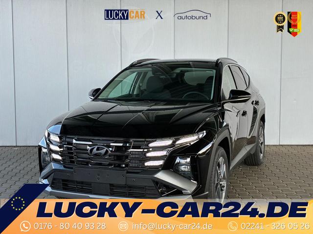Gebrauchtfahrzeug Hyundai TUCSON - E-Motion 1.6 T-GDI 2WD 48V DCT / Panoramadach ACC Sitz   Lenkradheizung LED Navi PDC V&H Kamera Alu 18"