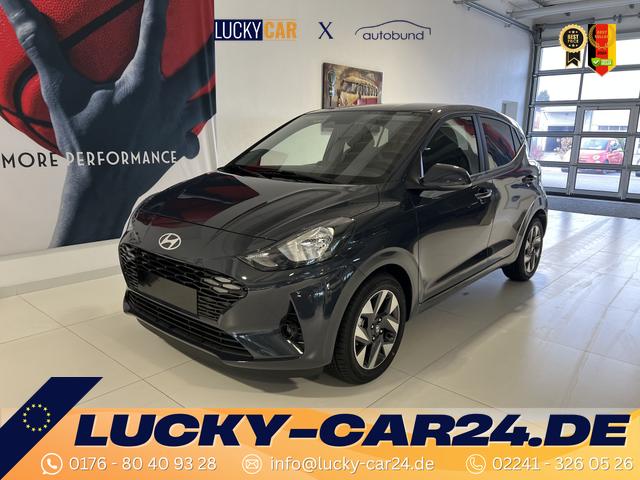 Lagerfahrzeug Hyundai i10 - GO  1.2 MT 58 kW (79 PS) Klimaautomatik, Navigationssystem, Apple CarPlay & Android Auto, Sitzheizung, Lenkradheizung, Einparkhilfe hinten, Rückfahrkamera, Privacy Glass, 15" Leichtmetallfelgen, uvm.
