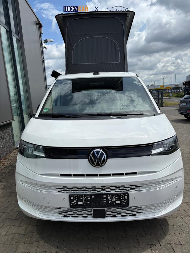 Volkswagen T7 California Beach Camper 2.0 TDI 150PS DSG (AUTOMATIK), Mini-K&uuml;che, Privacy-Glas, Aufstelldach, Klimaanlage, Parksensoren vorne und hinten, Digital Cockpit Pro, Radio Ready2Discover 10" + Wireless App-Connect, SIDE ASSIST, ACC, LED-Scheinwerfer, M-Lederlenkrad, Schiebet&uuml;ren 