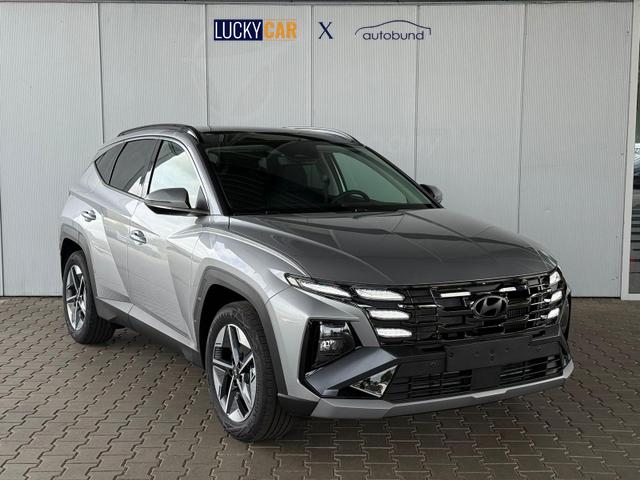 Hyundai TUCSON E-Motion 1.6 T-GDI 2WD 48V DCT / Panoramadach ACC Sitz + Lenkradheizung LED Navi PDC V&H Kamera Alu 18" 