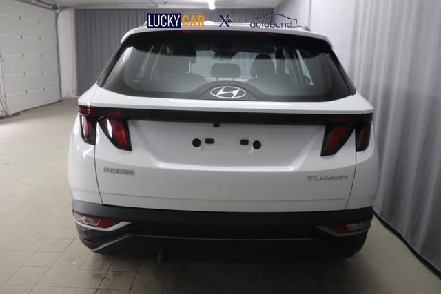 Hyundai Tucson 1.6 T-GDI 6MT 2WD Family MY23 110kW Polar White Sitzpolsterung in Stoff Schwarz