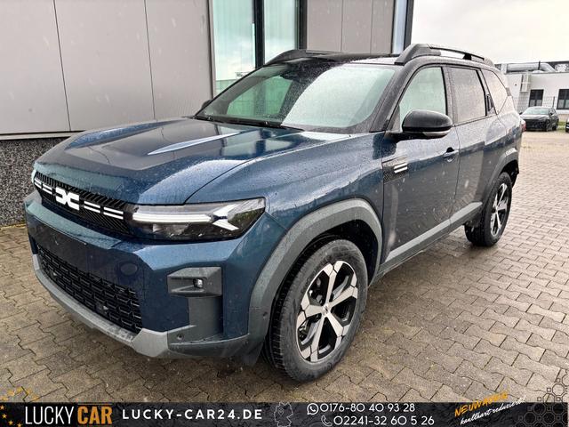 Lagerfahrzeug Dacia Bigster - Journey FULL-HYBRID 155 (Benzin Elektro), BLAU-METALLIC/DACH SCHWARZ, BEHEIZTE FRONTSCHEIBE, SITZHEIZUNG, LENRADKRADHEIZUNG, TOTER-WINKEL-ASSISTENT, PARKSENSOREN VORN/HINTEN, MULTIVIEW-KAMERA, 18" ALUFELGEN, PRIVACY-GLAS, NAVIGATION, ELEKTR. HECKKLAPPE, ACC