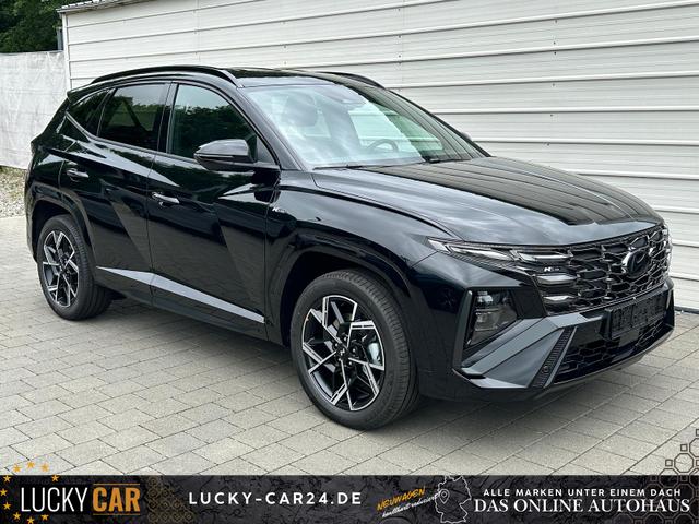 Lagerfahrzeug Hyundai TUCSON - N-Line N-Line  1.6 T-GDI HEV 4WD Android Auto HUD Navi SHZ Matrix KRELL 3Z Klimaauto Kamera Keyless E-Heck