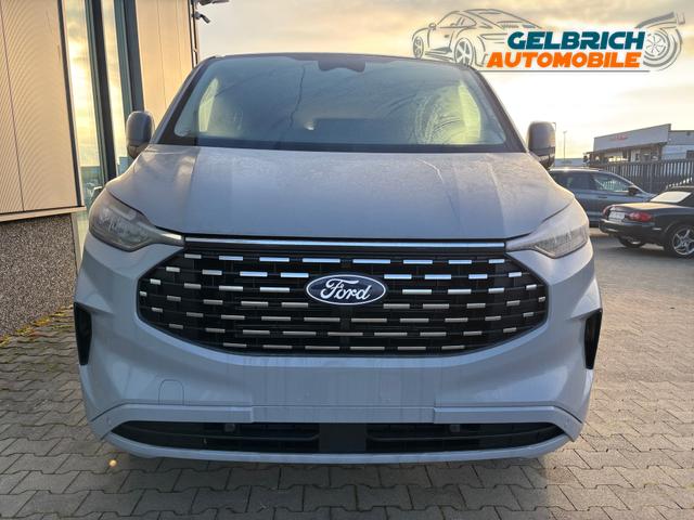 Ford Tourneo Custom Sport 2.5 Duratec Hybrid (PHEV) 232PS CVT (AUTOMATIK) L2 (LANGER RADSTAND) H1, 5J Garantie, 8 Plätze, 17" Alu, Schiebetüre re+li, Teil-Kunstlederpolster + Sitzheizung, 3-Zonen-Klimautomatik, Alarm, Privacy-Glas, Parksensoren v/h, Rückfahrkamera, LED-Scheinwe 