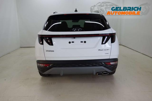 Tucson NX4 Prestige Line 1,6 T-GDi 4WD 48V DCT t1bp0-O1 Serenty White