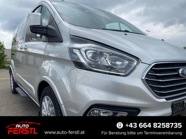Gebrauchtfahrzeug Ford Tourneo Custom - L2 Titanium X 150 mHEV 8 Sitz Klima Vor Hint PDC Temp SHZ LMF Kamera NAVI Leder AHK 230V
