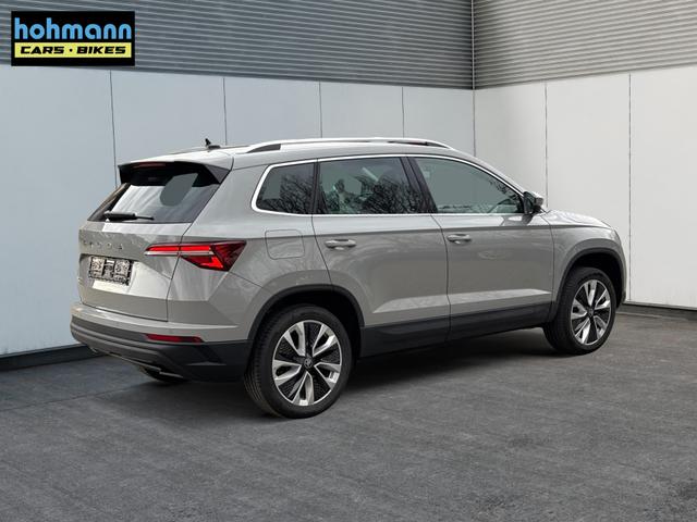 Skoda / Karoq / Grau / / / AHK+KAMERA+EL. HECKKL.+SHZ+ACC+KESSY+18''ALU