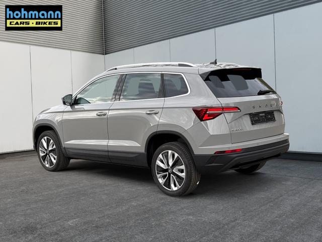 Skoda / Karoq / Grau / / / AHK+KAMERA+EL. HECKKL.+SHZ+ACC+KESSY+18''ALU
