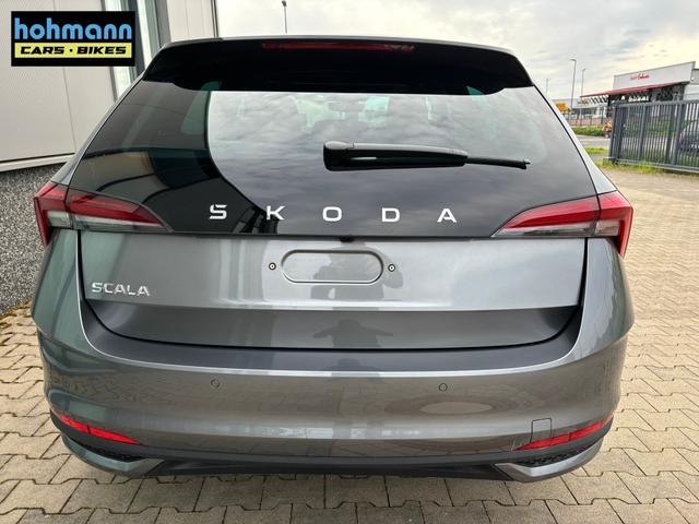 Skoda Scala Extra 1.0 TSI 95PS, 5 Jahre Garantie, 16" Alu, Parksensoren hinten, Rückfahrkamera, Sitzheizung, Climatronic, SunSet, Tempomat, Radio 8" + Smartlink, Full-LED-Scheinwerfer, NSW, Virtual Cockpit, Armlehne, M-Lederlenkrad, Easy Start 
