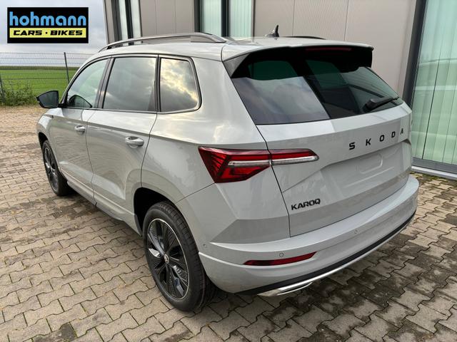 Skoda Karoq Selection Angebot f. Menschen mit Behinderung 100%! 2.0 TDI 150PS DSG, 16"Alu, Climatronic, Dachreling, M-Lederlenkrad, LED-Scheinwerfer, Tempomat, Parksensoren hinten, Virtual Cockpit 8", SunSet, Infotainment 8" + Wireless SmartLink 