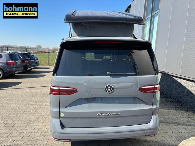 Volkswagen T7 California Ocean 2.0 TDI 150PS DSG, 16" Alu, ELEKTRISCHES Aufstelldach, Privacy-Glas, Climatronic, KÜCHE, Standheizung + FB, Sitzheizung, Park Assist, Parksensoren v/h, Kamera, IQ Light LED-MATRIX, Markise, Side ACC, Ganzjahresreifen, Radio 10" App-Connect 