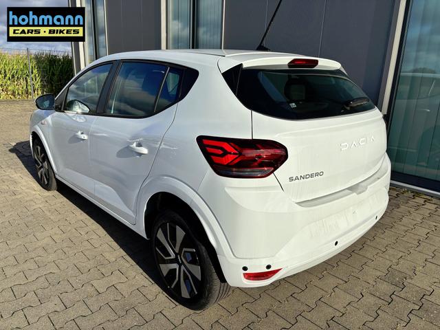 Dacia Sandero Expression 1.0 ECO-G 100 BENZIN/LPG-GASANLAGE, Weiß, Klimaanlage, NAVIGATIONSSYSTEM 8", Parksensoren VORNE + HINTEN, RÜCKFAHRKAMERA, TOTER-WINKEL-WARNER, Nebelscheinwerfer, Tempomat, Lederlenkrad, Armlehne, Spiegel elektr. einstell-/beheizbar, ZV mit Fernbedienung 