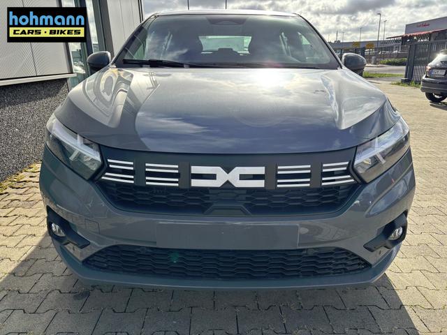 Dacia Sandero Expression 1.0 ECO-G 100 BENZIN/LPG-GASANLAGE, SONDERLACKIERUNG URBAN-GRAU, Klimaanlage, NAVIGATIONSSYSTEM 8", Parksensoren VORNE + HINTEN, RÜCKFAHRKAMERA, TOTER-WINKEL-WARNER, Nebelscheinwerfer, Tempomat, Lederlenkrad, Armlehne, Spiegel elektr. einstell-/beheizbar 