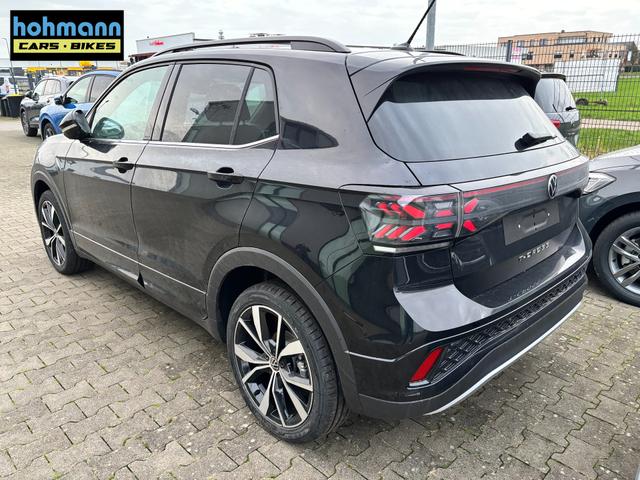 Volkswagen T-Cross R-Line Limited 1.0 TSI 115PS DSG, 5 JAHRE GARANTIE, CLIMATRONIC, SITZHEIZUNG, Schwarz-Metallic, 18" Alu, MATRIX-LED, Adaptiver Tempomat ACC, Parksensoren, R&uuml;ckfahrkamera, Keyless, Abgedunkelte Scheiben, Radio "Ready2Discover" + App-Connect, M-Lederlenkrad, Side Assist 