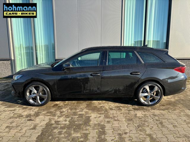 Cupra Leon Sportstourer Basis 1.5 TSI 150PS, 5J Garantie, SCHWARZ-METALLIC, ANH&Auml;NGERKUPPLUNG, EDGE-PAKET (KEYLESS, ALARM, R&Uuml;CKFAHRKAMERA), SCHALENSITZE / FAHRERSITZ ELEKTRISCH, SITZHEIZUNG, 18" ALU, ELEKTR. HECKKLAPPE, 3Z-Climatronic, ACC, Full Link, Parksensoren v/h, Privacy-Glas 