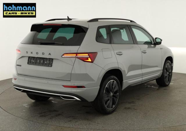 Skoda Karoq Sportline 1.5 TSI DSG Sportline, AHK, Navi, Matrix, Kamera, el. Klappe, 5-J. Garantie 