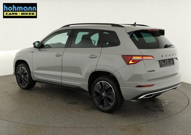 Skoda Karoq Sportline 1.5 TSI DSG Sportline, AHK, Navi, Matrix, Kamera, el. Klappe, 5-J. Garantie 