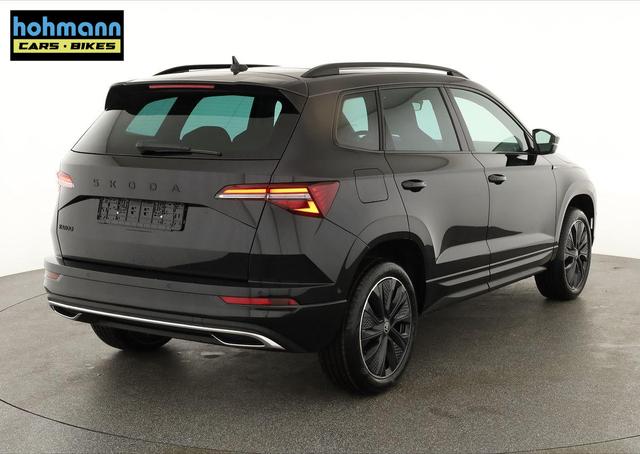 Skoda Karoq Sportline 1.5 TSI DSG Sportline, Pano, AHK, Navi, CANTON, Matrix, AreaView, Side, el. Klappe, FS-beheizbar, 5 J.-Garantie 