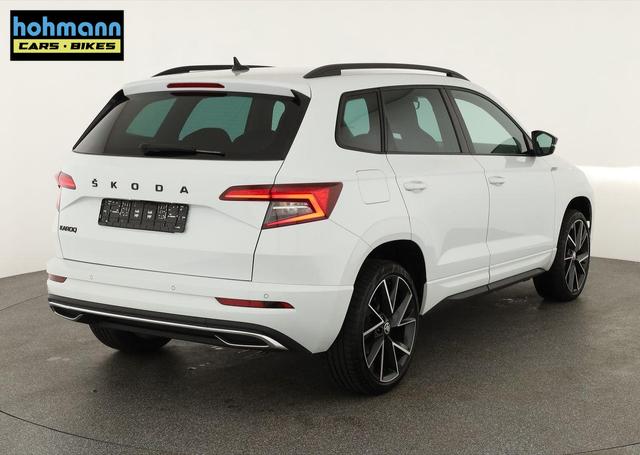 Skoda Karoq Sportline 1.5 TSI DSG Sportline, AHK, Navi, el. Klappe, ACC, Kamera, 19-Zoll 