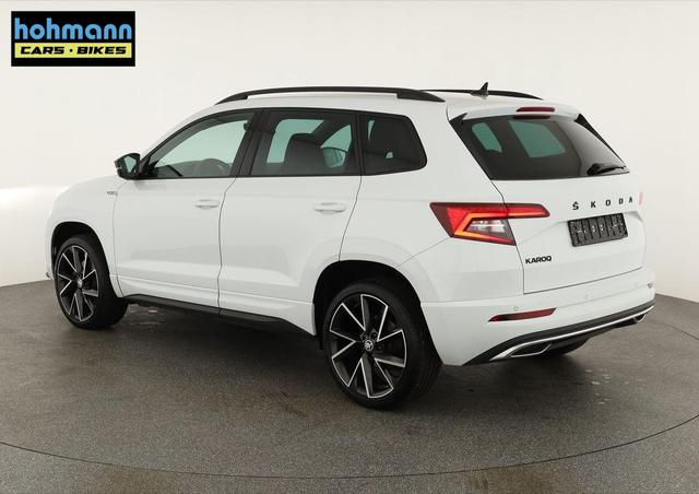 Skoda Karoq Sportline 1.5 TSI DSG Sportline, AHK, Navi, el. Klappe, ACC, Kamera, 19-Zoll 