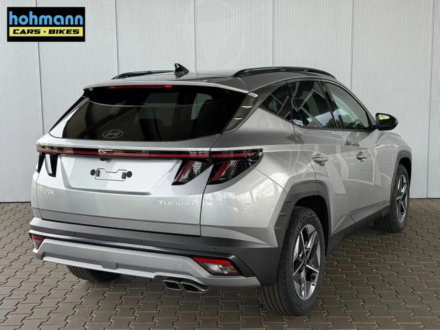 Hyundai TUCSON E-Motion 1.6 T-GDI 2WD 48V DCT / Panoramadach ACC Sitz + Lenkradheizung LED Navi PDC V&H Kamera Alu 18" 