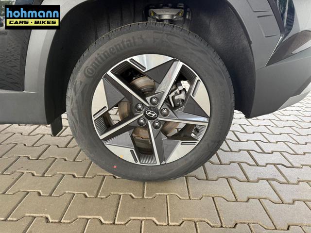 Hyundai TUCSON E-Motion 1.6 T-GDI 2WD 48V DCT / Panoramadach ACC Sitz + Lenkradheizung LED Navi PDC V&H Kamera Alu 18" 