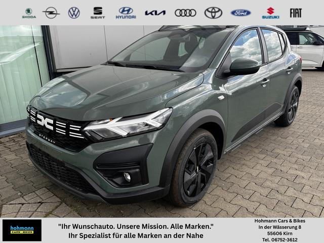 Dacia Sandero Stepway - Expression 1.0 ECO-G100 LPG-GASANLAGE/BENZIN, Safari-Grün Metallic, MEDIA NAVIGATION 8", Klimaanlage, Parksensoren hinten, Tempomat, Dachreling, Lederlenkrad, 4x elektr. Fensterheber, Armlehne, Spiegel einstell-/beheizbar, ZV mit Fernbedienung