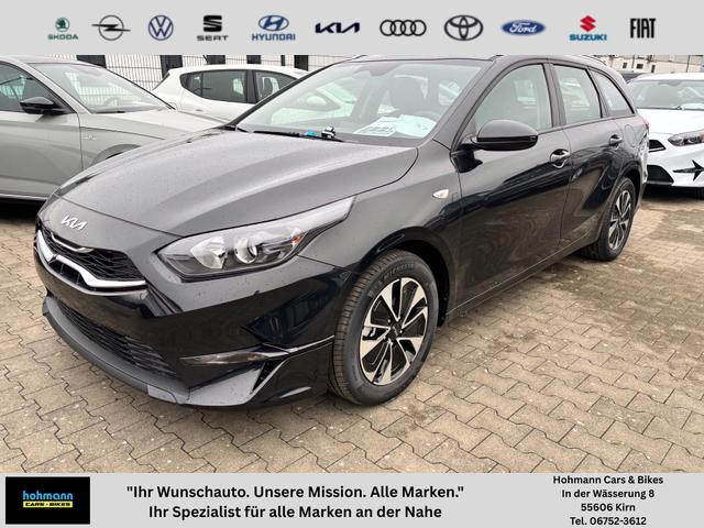 Kia Ceed Sportswagon - Spin 1.5 T-GDI 140PS 6-Gang, Schwarz-Metallic, 16" Alufelgen, Klimaanlage, Winter-Paket, Navigationssystem 10,25", Parksensoren hinten, Rückfahrkamera, Tempomat, Dachreling, Beheiztes Lederlenkrad, ZV mit Fernbedienung, Reserve-Notrad