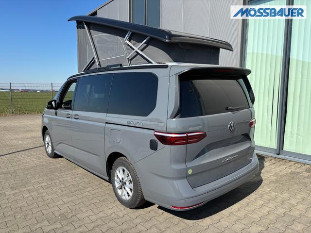 Volkswagen T7 California Ocean 2.0 TDI 150PS DSG, 16" Alu, ELEKTRISCHES Aufstelldach, Privacy-Glas, Climatronic, KÜCHE, Standheizung + FB, Sitzheizung, Park Assist, Parksensoren v/h, Kamera, IQ Light LED-MATRIX, Markise, Side ACC, Ganzjahresreifen, Radio 10" App-Connect 
