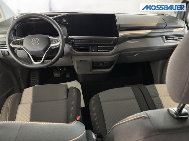Volkswagen T7 Caravelle PanAmericana 2.0 TDI 150PS LANGER RADSTAND, 8-Sitzer, 17" Alu, NAVIGATION 13", Sitzheizung, M-Lederlenkrad, LED-Scheinwerfer, 3-Zonen-Climatronic, Parksensoren vorn/hinten, Rückfahrkamera, Privacy-Glas, Tempomat, Digitales Cockpit 