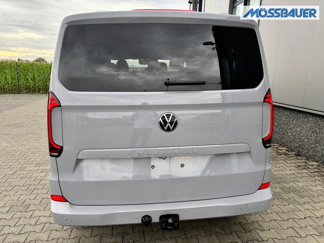 Volkswagen T7 Caravelle Style 2.0 TDI 110PS, 8-Sitzer, 17" Alu, IQ.LIGHT MATRIX-LED, NAVIGATION 13", Kunstlederpolster + Sitzheizung, Schiebetüre links/rechts, Keyless, M-Lederlenkrad, 3-Zonen-Climatronic, Parksensoren vorn/hinten, Rückfahrkamera, Privacy-Glas, Tempomat 