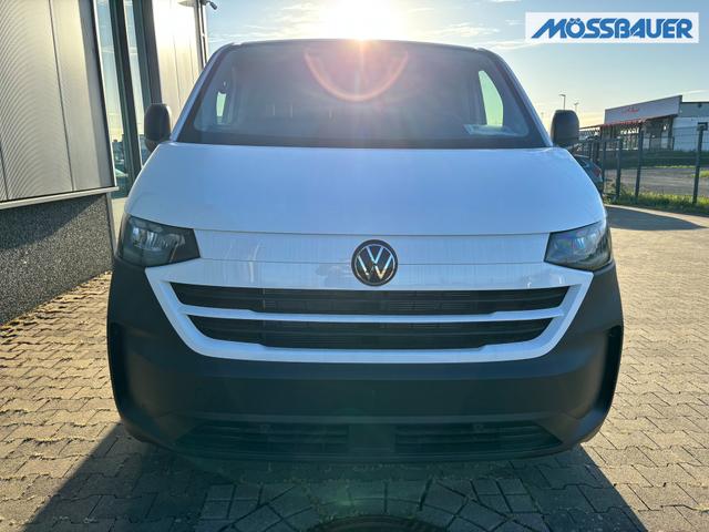 Volkswagen T7 Kastenwagen Basis 2.0 TDI 170PS AUTOMATIK LANG, Weiß, HECKFLÜGELTÜREN, 2-Zonen-Klimautomatik, M-Lederlenkrad, Anhängerkupplung, Parksensoren vorn/hinten, Rückfahrkamera, Frontscheibe beheizbar, Ganzjahresreifen, Sitzpaket 46 (inkl. Sitzheizung), Reserverad, 70l Tank 