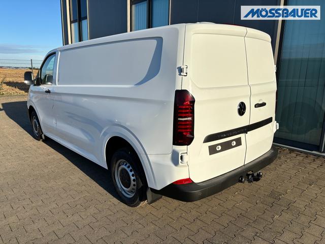 Volkswagen T7 Kastenwagen Basis 2.0 TDI 170PS AUTOMATIK LANG, Weiß, HECKFLÜGELTÜREN, 2-Zonen-Klimautomatik, M-Lederlenkrad, Anhängerkupplung, Parksensoren vorn/hinten, Rückfahrkamera, Frontscheibe beheizbar, Ganzjahresreifen, Sitzpaket 46 (inkl. Sitzheizung), Reserverad, 70l Tank 