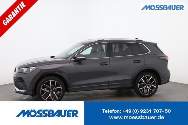 Volkswagen Tiguan - Basis 1.5 eTSI (Mild-Hybrid) ACT 130PS DSG/AUTOMATIK, LED-Scheinwerfer, Parksensoren vo/hi, Rückfahrkamera, Digital Cockpit Pro, Radio Ready2Discover 12,9", Climatronic, M-Lederlenkrad, Dachreling