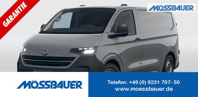 Volkswagen T7 Kastenwagen - Basis 2.0 TDI 150PS, Grau, 2-Zonen-Klimautomatik, M-Lederlenkrad, Anhängerkupplung, Parksensoren vorn/hinten, Rückfahrkamera, Frontscheibe beheizbar, Ganzjahresreifen, Sitzpaket 46 (inkl. Sitzheizung), Reserverad, 70l Tank, Laderaumpaket
