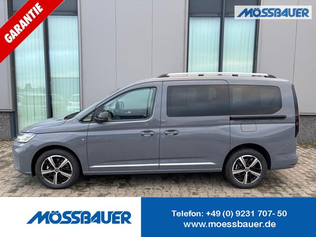Volkswagen Caddy - Style MAXI 7-SITZER 1.5 TSI 115PS DSG/AUTOMATIK, PURE-GREY, 17" Alu/Ganzjahresreifen, Winterpaket, ACC-Tempomat, Toter-Winkel, ParkAssist, Parksensoren vo/hi, Rückfahrkamera, Radio Ready2Discover 10" + Wireless AppConnect, Climatronic, Abgedunkelte Scheiben