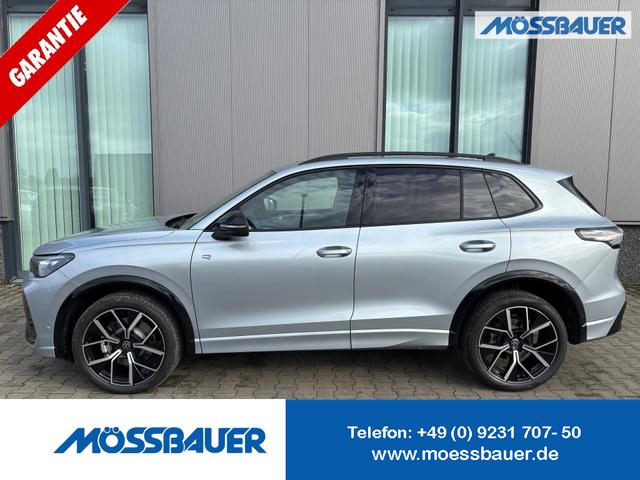 Volkswagen Tiguan - R-Line 2.0 TDI 4MOTION 193PS DSG, Oyster-Silver-Metallic, PANORAMADACH, ANHÄNGERKUPPLUNG, IQ LIGHT, DESIGN-PAKET Black&Style, NAVI, DCC-Fahrwerk, 20" LEEDS schwarz, Area View, Alarm, Elektr. Heckklappe, Keyless,Massagefunktion, Park Assist, ACC, Sitzheizung, Cl