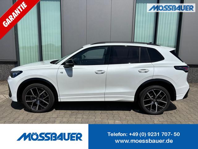 Volkswagen Tiguan - R-Line 2.0 TDI 4MOTION 193PS DSG, PANORAMADACH, ANHÄNGERKUPPLUNG, IQ LIGHT, DESIGN-PAKET Black&Style, NAVI, DCC-Fahrwerk, 20" LEEDS schwarz, Area View, Alarm, Elektr. Heckklappe, Keyless,Massagefunktion, Park Assist, ACC, Sitzheizung, Climatranic