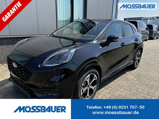 Ford Puma - ST-Line 1.0 EcoBoost 125PS AUTOMATIK, SCHWARZ-Metallic, Reserverad, Elektr. Heckklappe, Key-Frey-System, Spiegel anklappbar, Induktives Laden, 17" Alu, NAVIGATION, Klimaautomatik, Privacy-Glas, Parksensoren hinten, Rückfahrkamera, Tempomat, Sportfahrwerk