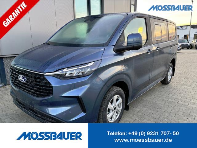 Ford Tourneo Custom - Trend 2.0 TDCi 136PS L1H1, 5 Jahre Garantie, 8 Plätze, AHK, 2 Schiebetüren, Privacy, Metallic, 16" Alu + Allwetter, PDC vo/hi, Kamera, LED-Scheinwerfer, Keyless, Beheizte Frontscheibe, Radio 13", AndroidAuto/Apple CarPlay, Tempomat, 3-Zonen-Klimaautomatik