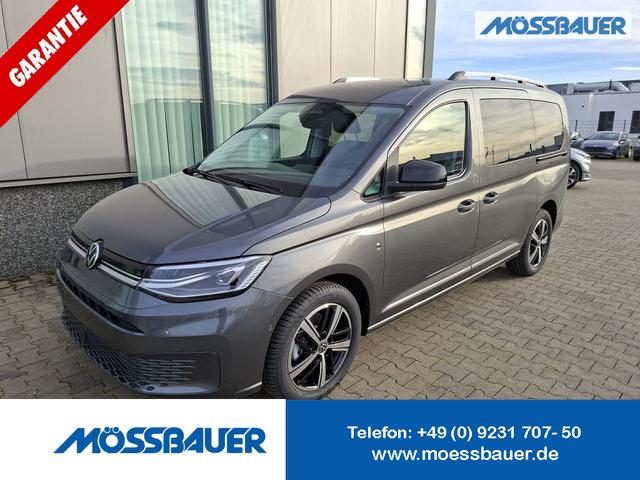 Volkswagen Caddy - Style MAXI 7-SITZER 1.5 TSI 115PS DSG/AUTOMATIK, INDIUM-GRAU, 17" Alu/Ganzjahresreifen, Winterpaket, ACC-Tempomat, Toter-Winkel, ParkAssist, Parksensoren vo/hi, Rückfahrkamera, Radio Ready2Discover 10" + Wireless AppConnect, Climatronic, Abgedunkelte Scheiben