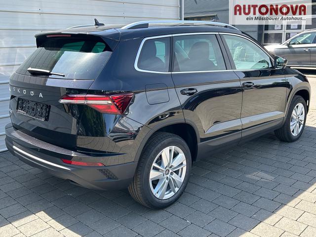 Skoda Karoq Extra Plus 2.0 TDI DSG AHK*Android Auto*Matrix*E-Heck*SHZ*ACC*Keyless*Kamera*17" LM* 2Z Klimaauto*SUNSET 