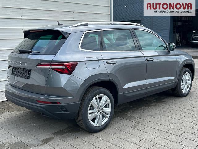 Skoda Karoq Extra 2.0 TDI DSG AHK*Android Auto*SHZ*ACC*Keyless*Kamera*17" LM* 2Z Klimaauto*SUNSET 