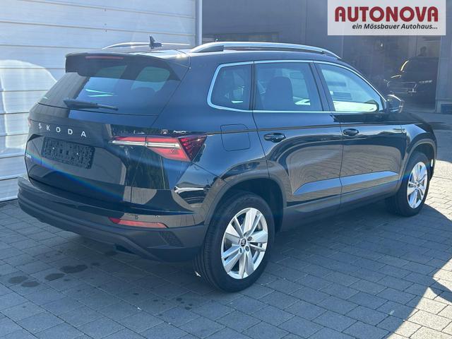 Skoda Karoq Extra 2.0 TDI DSG AHK*Android Auto*SHZ*ACC*Keyless*Kamera*17" LM* 2Z Klimaauto*SUNSET 